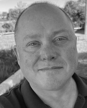 TOM BURDETT